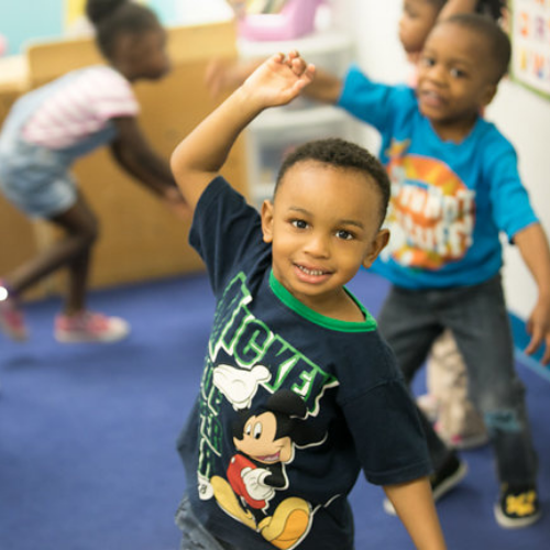 Children playing in a classroom