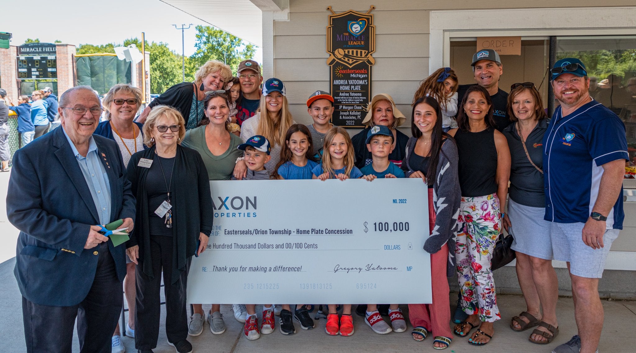 check presentation ribbon cutting event