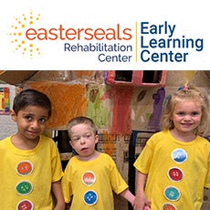 Atticus & Michael & Charlotte hold hands on graduation day at Easterseals Early Learning Center