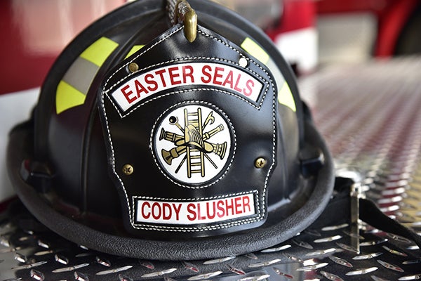 Close up of Cody's fireman hat