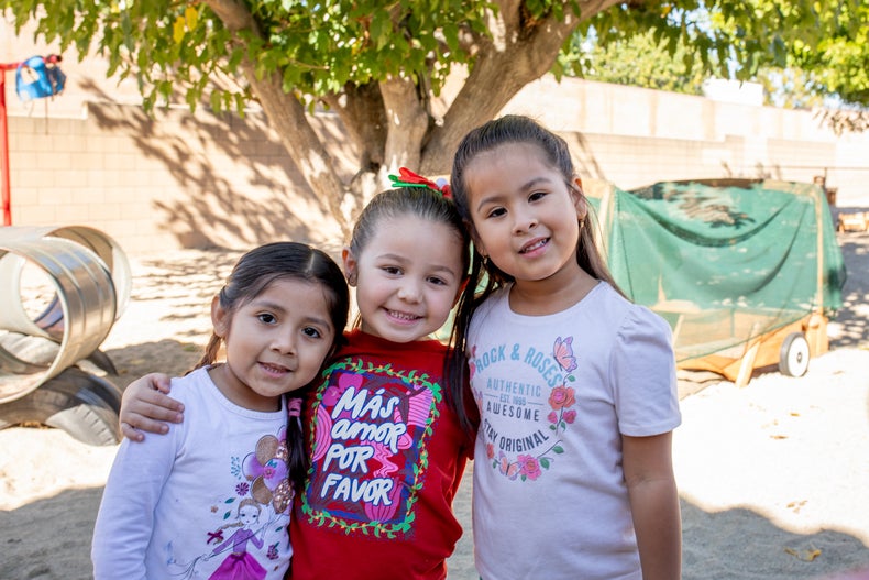 3 children hugging