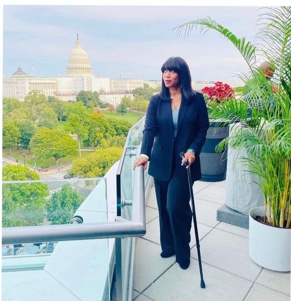 Andrea on a patio overlooking Washington DC 
