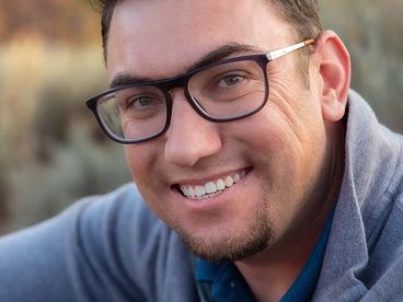Headshot of Scott Klumb, a white man with glasses