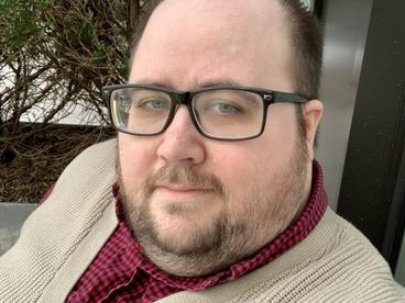 headshot of Mids Meinberg