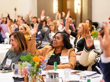 A group of Easterseals colleagues gathers during the National Network Summit, a bi-annual event focused on leadership and learning