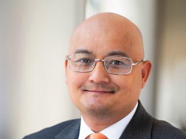 Headshot of Tom Nguyen
