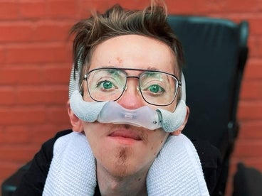 Steve Way sitting in his wheelchair, wearing glasses 