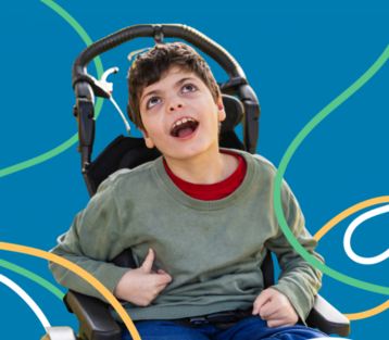 A young boy using a wheelchair