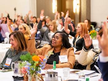 A group of Easterseals colleagues gathers during the National Network Summit, a bi-annual event focused on leadership and learning