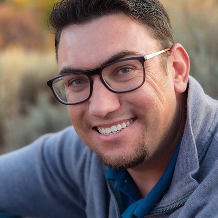 Headshot of Scott Klumb, a white man with glasses