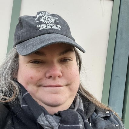Shoshana wearing a hat