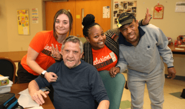 The I/DD program participants and the Direct Support Professionals pictured in this photograph have photo releases signed with Easterseals. This photo was taken on an advocacy day, where staff wore matching advocacy t-shirts.