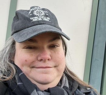 Shoshana wearing a hat