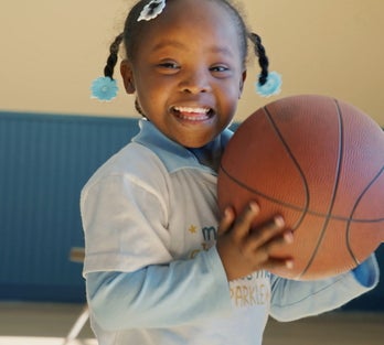 Katelyn holding a basketball