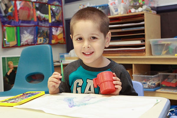 Kid painting at CDC Ontario