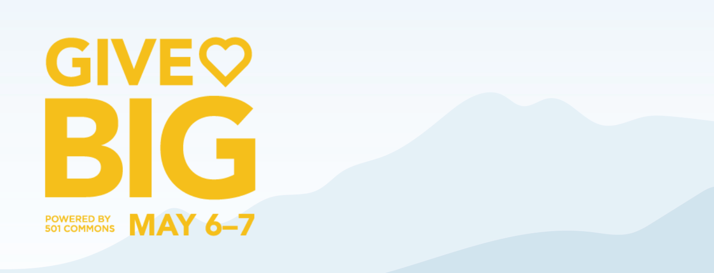 GiveBIG logo set on a background of a mountain range