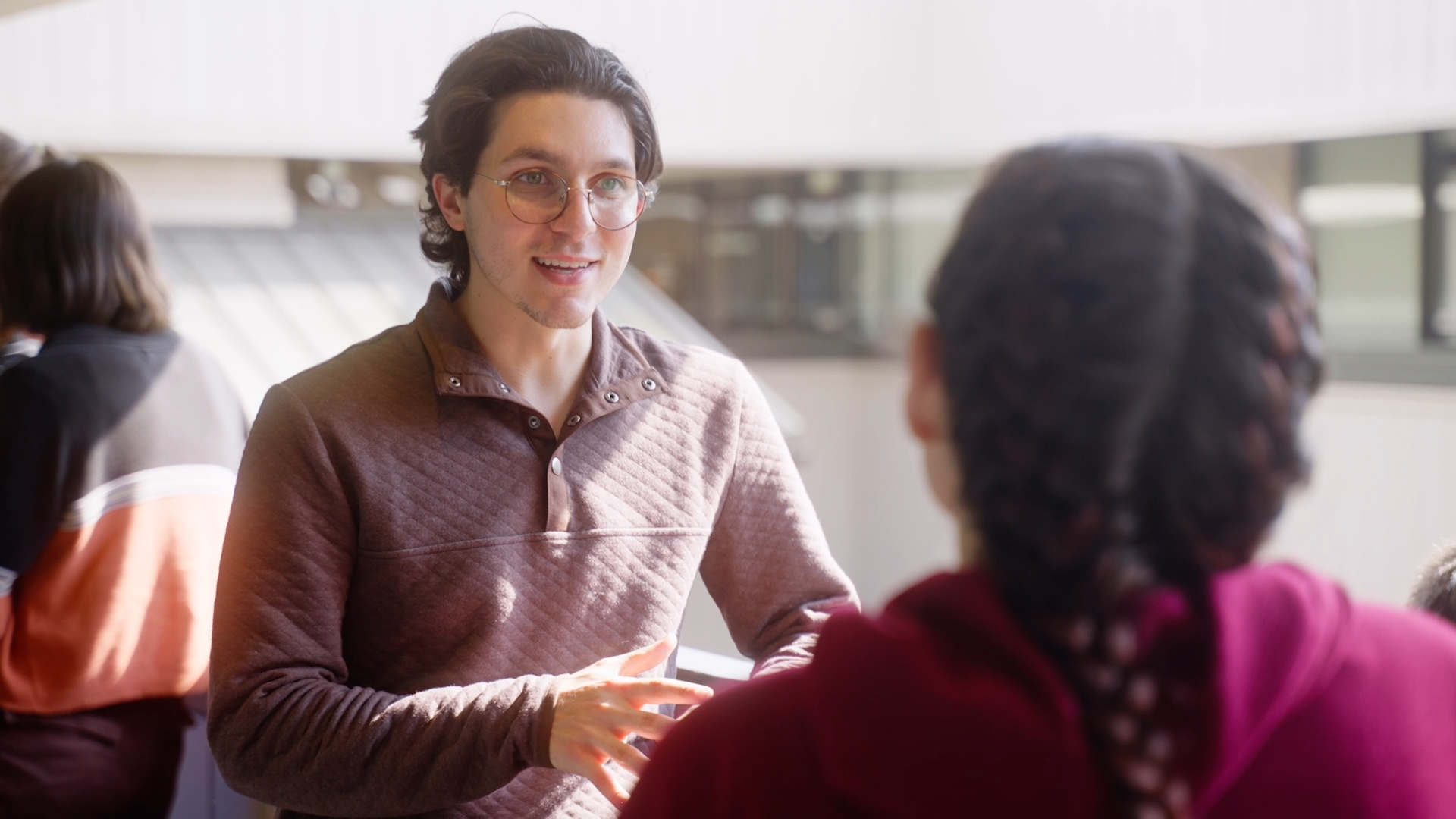 A therapist at OPAC speaking to a caregiver