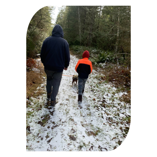 Harrison walking on a trail